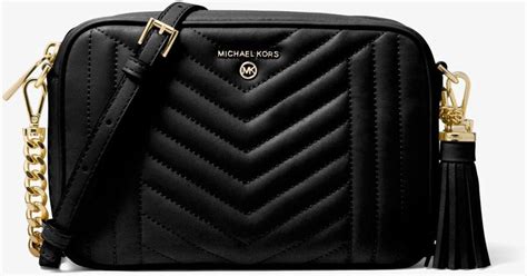 jet set medium quilted leather camera bag michael kors|michael kors jet set charm.